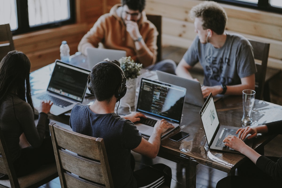 Team members collaborating around a table