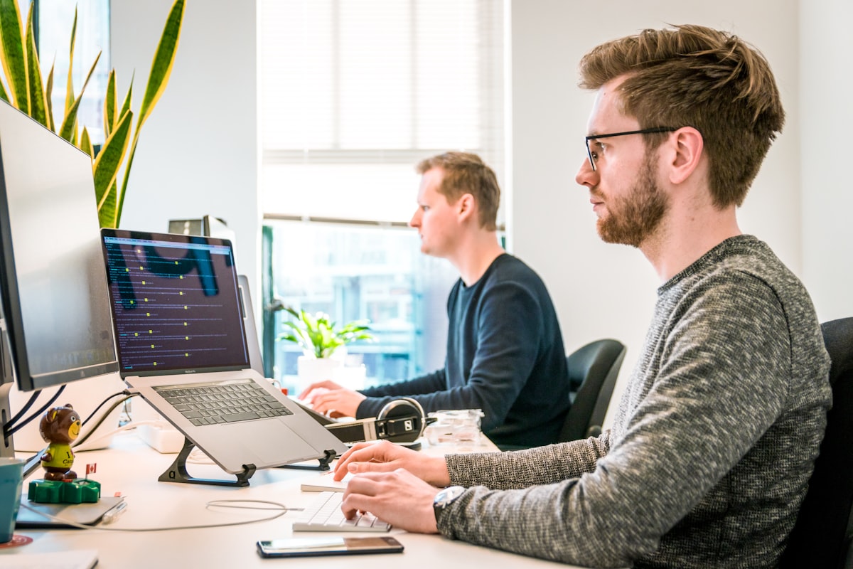 Team collaborating on technology projects in a modern office